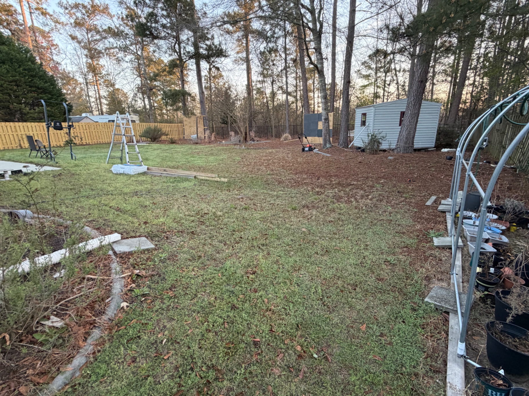 Yard before seasonal cleanup by RC Landscaping